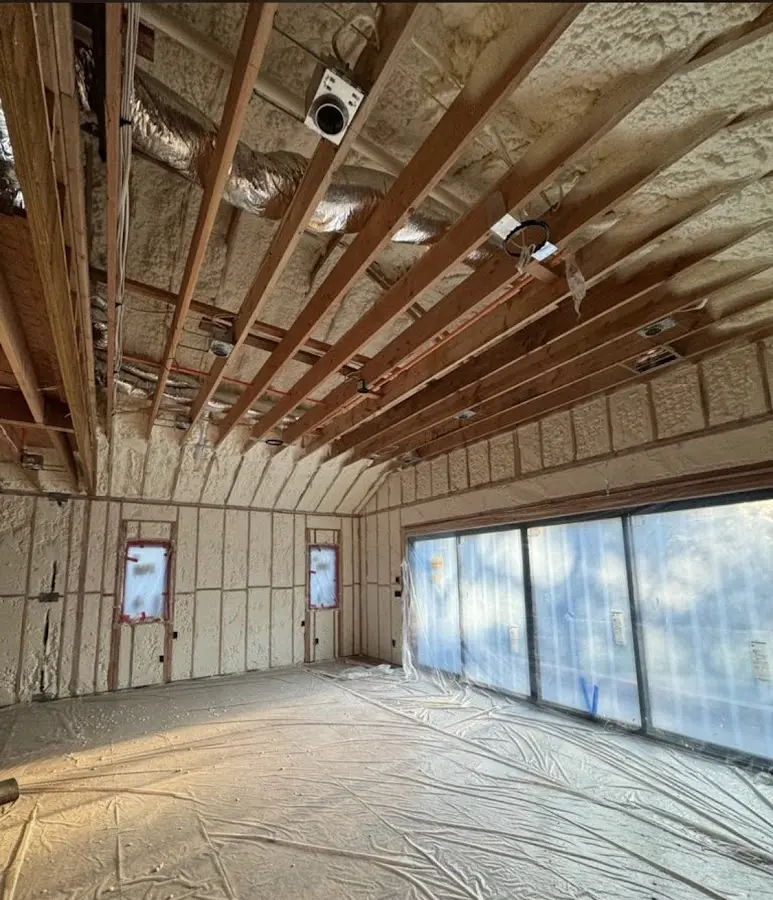 Interior walls and ceiling insulated with spray foam during new construction in Middletown